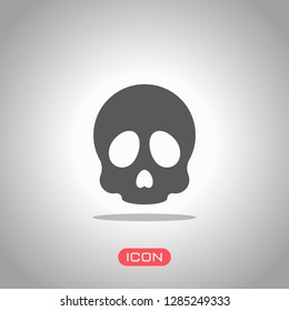 Simple skull icon. Icon under spotlight. Gray background