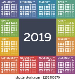 Simple square colorful calendar for 2019 on dark background. Week starts Monday
