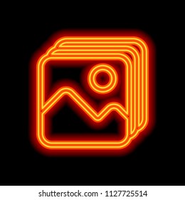 Simple stack of pictures. Orange neon style on black background. Light icon