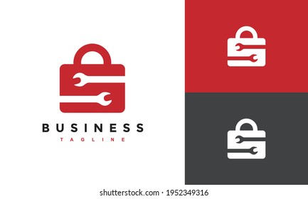 simple suitcase and wrench logo