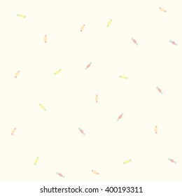 simple sweets candy on light yellow background. seamless vector pattern.