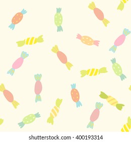 simple sweets candy on light yellow background. seamless vector pattern.