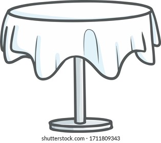 Simple table with white clean tablecloth for dinner
