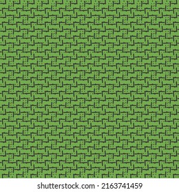 Simple textile design with broken lines and tiny flecks, made in black on a green background. Wallpaper pattern. 