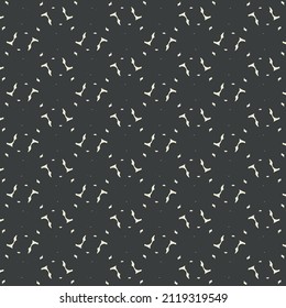 Simple textile pattern consisting of white marks and flecks on a flat black support. Scarf design.