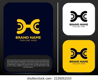 Simple tools vector wrench logo. Simple spanner logo design element on dark background
