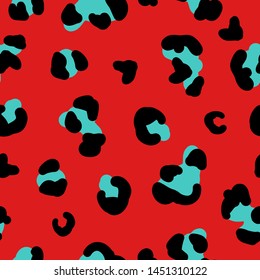 Simple trend pattern. Red background, black and blue leopard spots. The print is well suited for Wallpaper,textiles, banners and postcards.