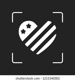 simple USA flag icon. Heart shape. White object in camera autofocus on dark background