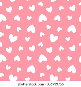 Simple Valentines day background. Hearts seamless vector pattern. Flat design texture made of heart silhouettes of various size. 