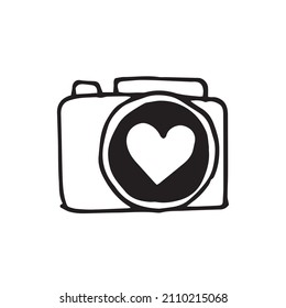 simple vector drawing in doodle style. camera. cute illustration camera and heart. hobby, photography
