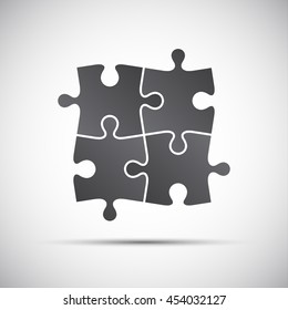 Simple vector illustration of a four pieces puzzle