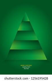 Simple vector origami paper christmas tree isolated on green background