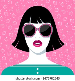 Simple vector portrait of beautiful young woman with full pink lips, black hair, wearing fashionable large colorful spotted sunglasses against pink background with strawberry pattern