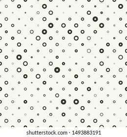 Simple vector seamless mosaic pattern with circles rings random thickness and size. White and grey texture.