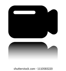 Simple video camera icon. Black icon with mirror reflection on white background