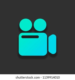 Simple video camera icon. Colorful logo concept with soft shadow on dark background. Icon color of azure ocean