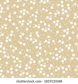 Einfaches Blumenmuster aus der Vintage. Kleine weiße Blumen auf beigem Hintergrund. Vektorstruktur. Eleganter Druck für Tapete.