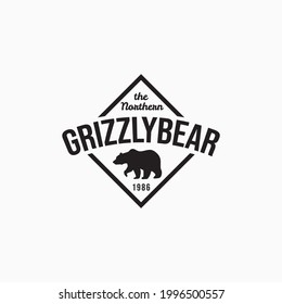 Simple vintage grizzly bear emblem vector illustration design. Minimalist bear logo design.