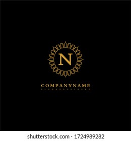 simple vintage N logo letter in gold color creative design concept