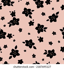 Simple vintage pattern. Black  flowers and leaves. light pink  background. Fashionable print for textiles and wallpaper.