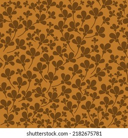 Simple vintage pattern. brown flowers. mustard background. Fashionable print for textiles and wallpaper.