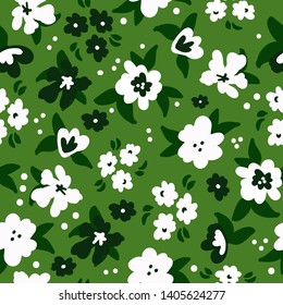 Simple vintage pattern of flowers. Green background, white flowers. The print is well suited for textiles,packaging and postcards.