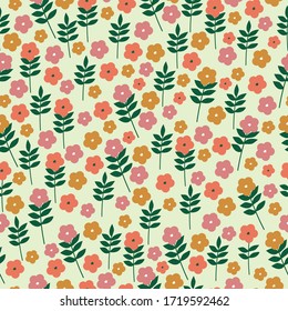 Simple vintage pattern. Light background, small pink and orange flowers. The print is well suited for textiles, Wallpaper and packaging.