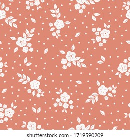 Simple vintage pattern. Pale orange background, white flowers ornament, dots. The print is well suited for textiles, Wallpaper and packaging.