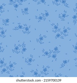 Simple vintage pattern. small blue  flowers and leaves. light blue   background. Fashionable print for textiles, wallpaper and packaging.