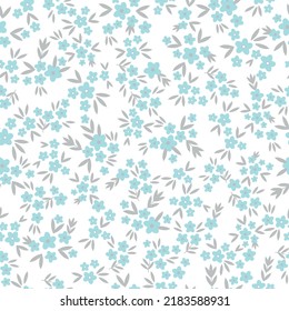 Simple vintage pattern. small blue  flowers, grey leaves. white  background. Fashionable print for textiles and wallpaper.