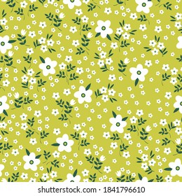 Simple vintage pattern. Small and large white flowers. Mustard background. Vector texture. Elegant fashion print for Wallpaper.