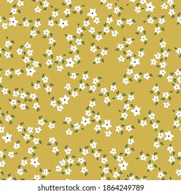 Simple vintage pattern. Small white flowers. Mustard background. Vector texture. Fashionable print for textiles and Wallpaper.