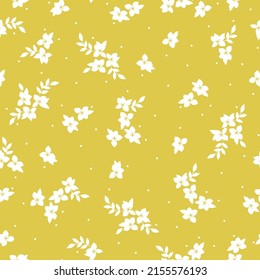 Simple vintage pattern. Small white flowers and leaves. Yellow background. Fashionable print for textiles, wallpaper and packaging.