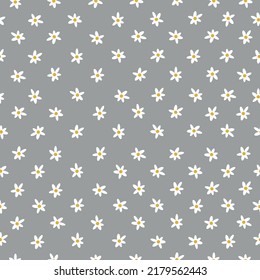 Simple vintage pattern. small white flowers. grey background. Fashionable print for textiles and wallpaper.