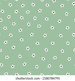 Patrón vintage simple. pequeña flor blanca. fondo verde claro. Impresión de moda para textiles y papel pintado.