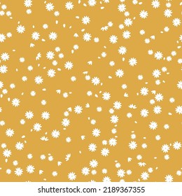 Simple vintage pattern. small white flowers. yellow background. Fashionable print for textiles and wallpaper.