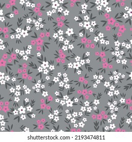 Simple vintage pattern. small white and pink flowers , dark grey  leaves. grey background. Fashionable print for textiles and wallpaper.