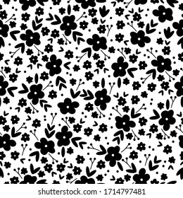 Simple vintage pattern. White background, black ornament flowers, plants. The print is well suited for textiles, Wallpaper and packaging.