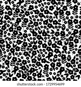 Simple vintage pattern. White background, black ornment little flowers. The print is well suited for textiles, Wallpaper and packaging.