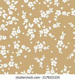 Simple vintage pattern. white  flowers and leaves. beige  background. Fashionable print for textiles and wallpaper.