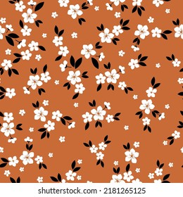 Patrón vintage simple. flores blancas, hojas negras. fondo terracota. Impresión de moda para textiles y papel pintado.