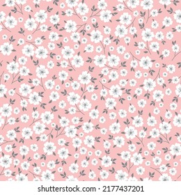 Simple vintage pattern. wonderful
white flowers ,grey leaves. pink  background. Fashionable print for textiles and wallpaper.