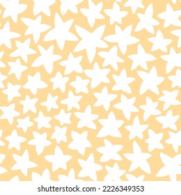 Simple white hand-drawn stars on yellow seamless pattern vector. Easy spring endless texture with fantasy stars. Chaotic stars monochrome seamless pattern is perfect for nursery, baby clothes and more