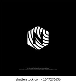 simple white hexagon N logotype with line print pattern isolated on black background vector illustration design concept
