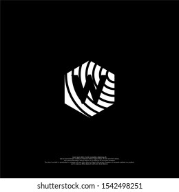 simple white hexagon W logotype with line print pattern isolated on black background vector illustration design concept