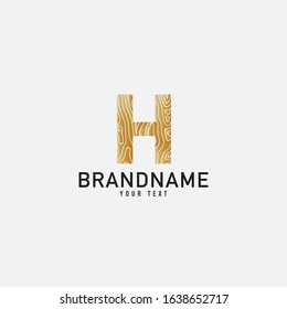 Simple wooden texture brown monogram H logo letter creative design concept.