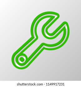 Simple wrench. Linear, thin outline. Paper style. Cut symbol with green bold contour on shape and simple shadow