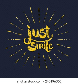 Simple Yellow Just Smile Texts with Rays on Gray Background Graphic Design.