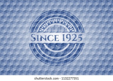 Since 1925 blue emblem or badge with abstract geometric pattern background.