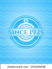 Since 1925 light blue water style badge.